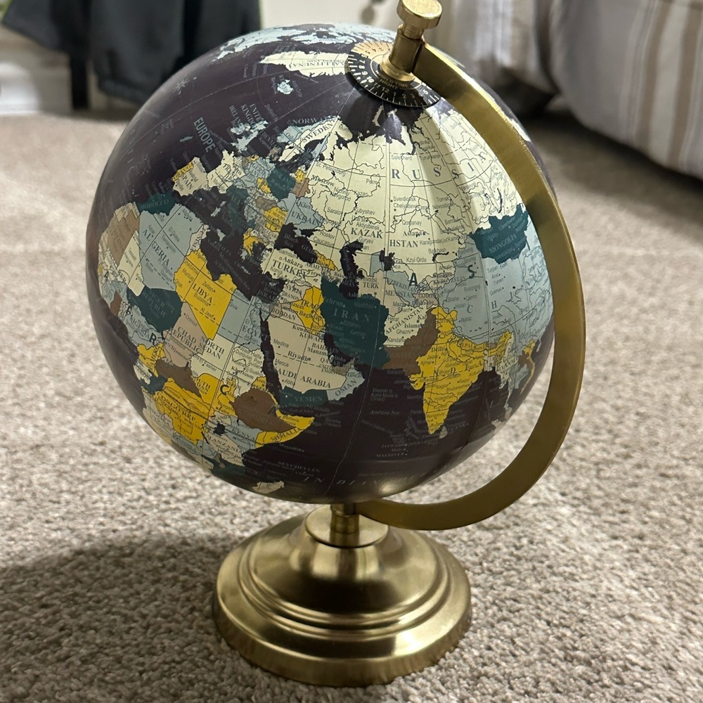 Small plastic rotating globe